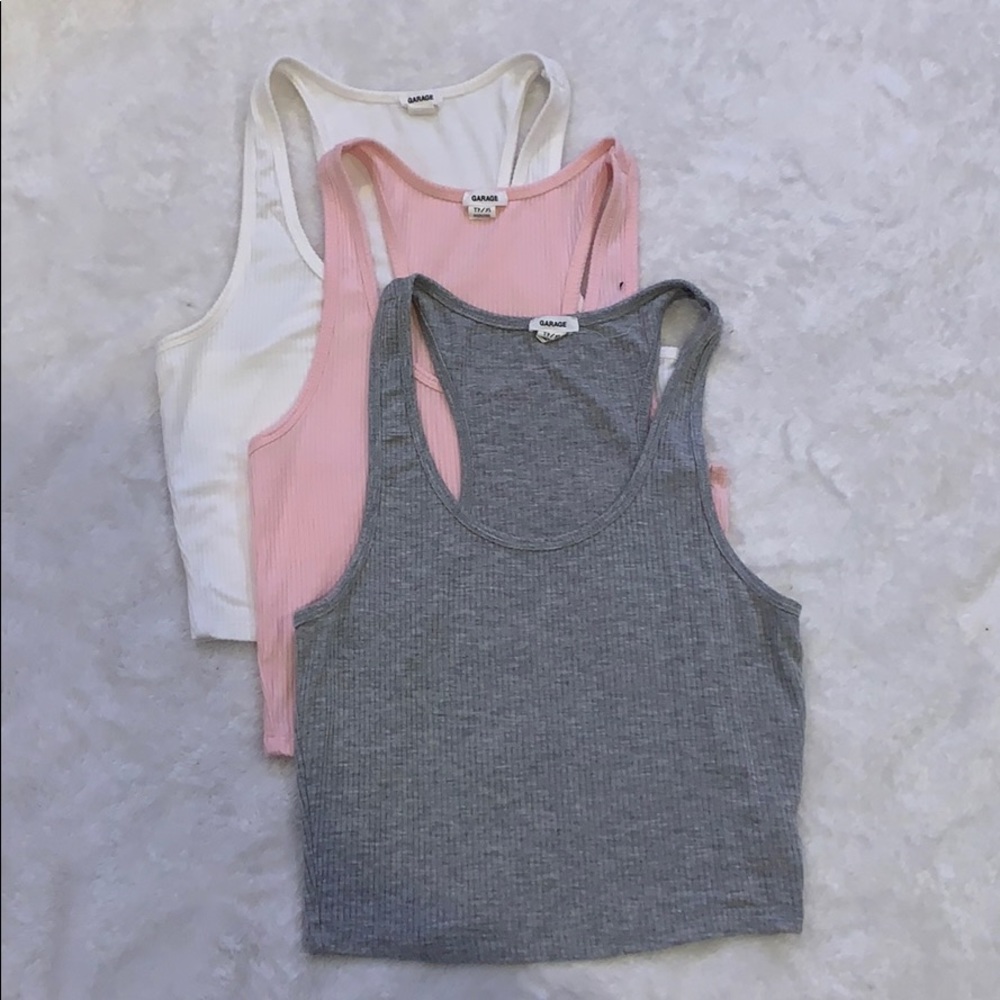 three different colors of garage racerback tops